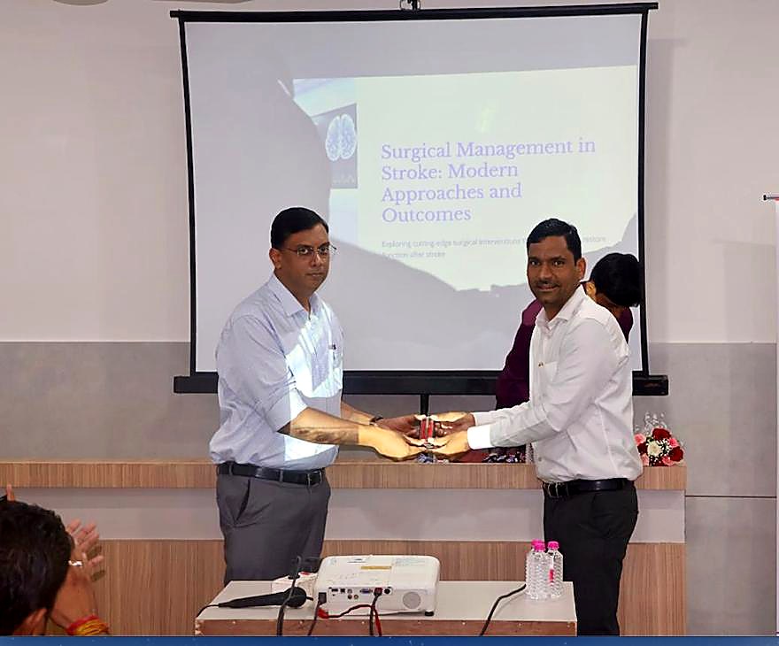 Dr. Navneet Agarwal presenting 'Surgical Management in Stroke: Modern Approaches and Outcomes'